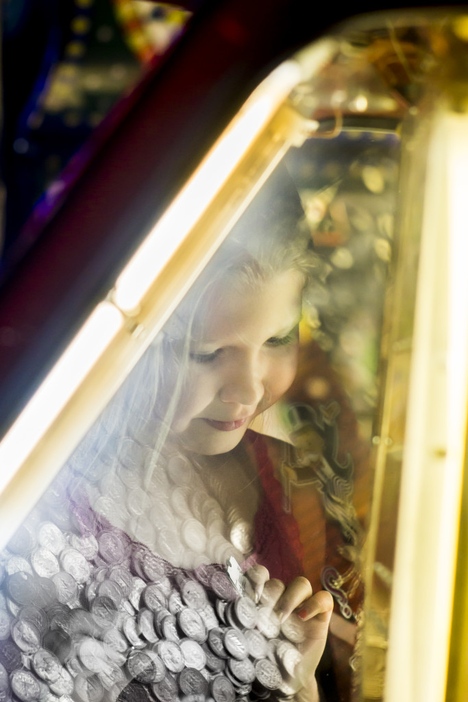 A young girl at an arcade